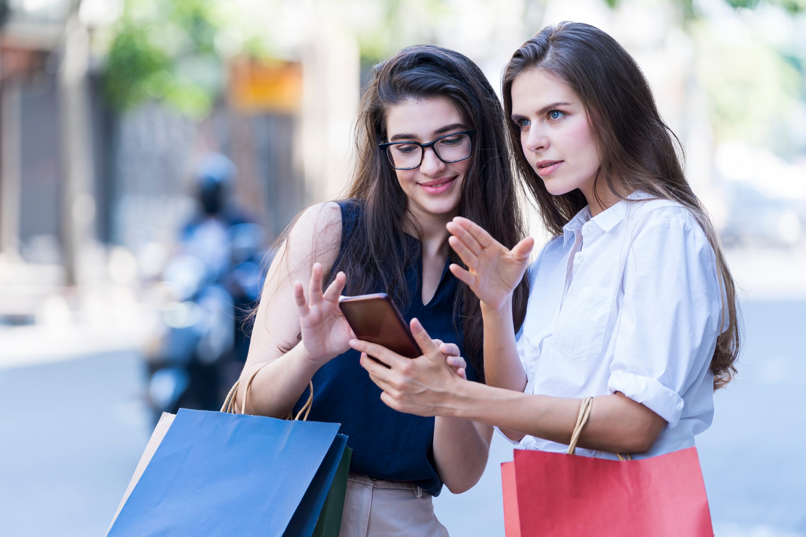 Two people giving direct sales tips to each other