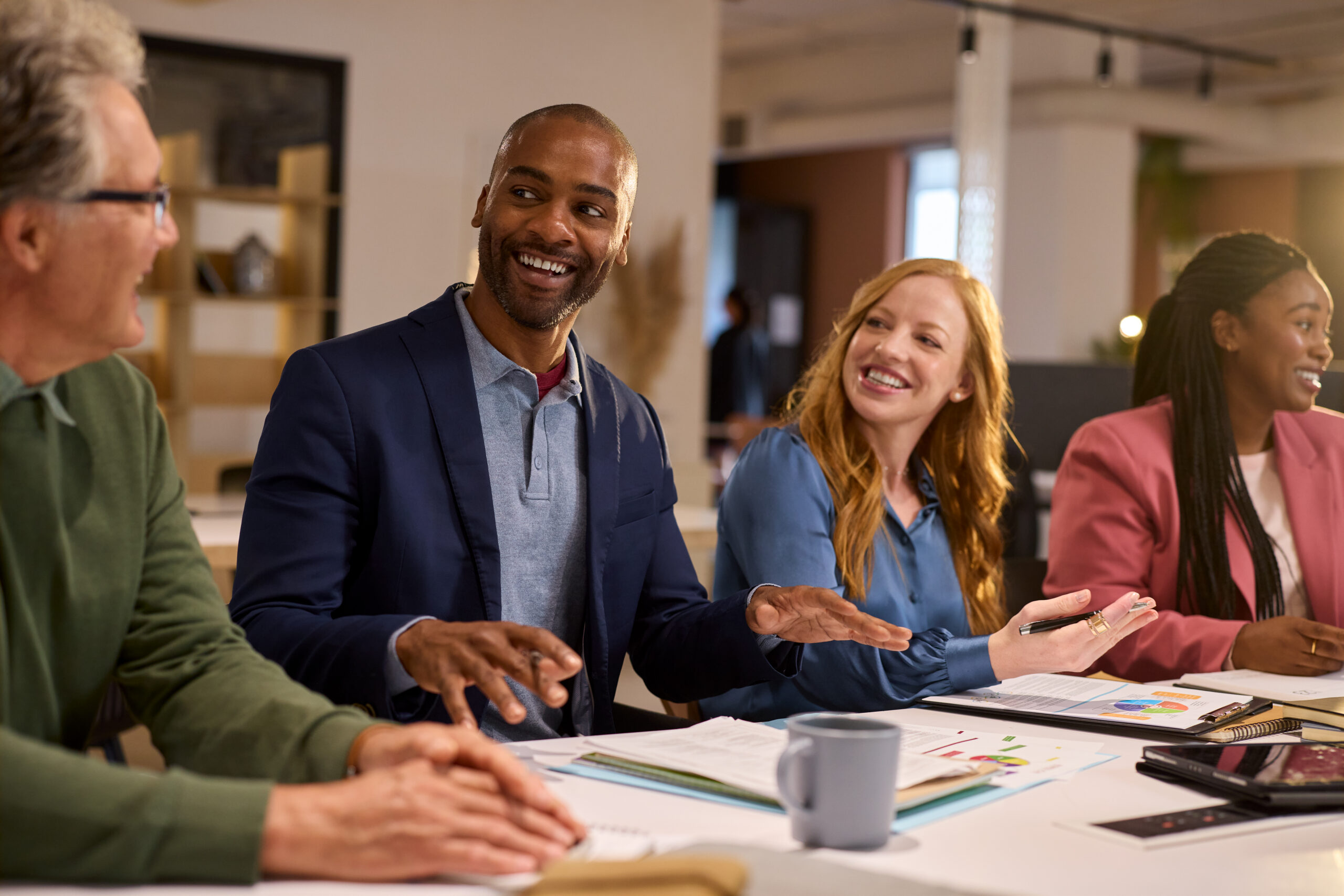 A group of professionals in a business mentorship program